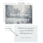 Schneefall im Winterwald Feiertagskarte<br><div class="desc">Senden Sie Ihre herzlichen Weihnachts- und Neujahrsgrüße mit unserer Foto Postcard. Diese hübsche Postkarte umrahmt eine atemberaubende, schneebedeckte Waldlandschaft in beruhigenden Weiß- und Pastellblau und erinnert an ein friedliches Winterwunderland. Mit einer personalisierten Textnachricht für Freunde, Kollegen, Kunden und Familie den Geist der Saison wecken. Der Text auf der Vorderseite und...</div>
