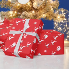 Schneeflocke und Weihnachten mit Schlitten über We Geschenkpapier