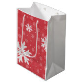 Schneeflocken am Heiligabend Postkarte Mittlere Geschenktüte (Vorderseite Schrägansicht)