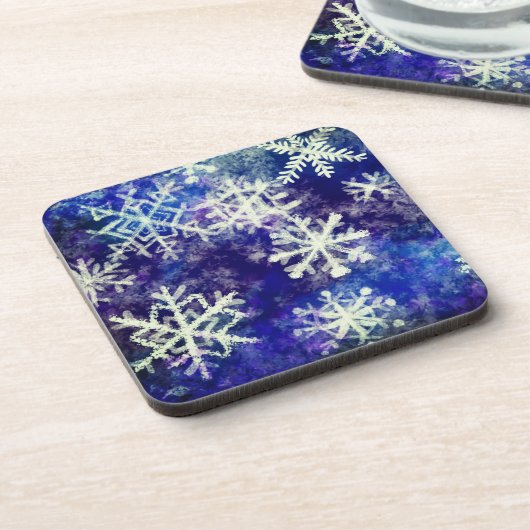Schneeflocken auf blauem Getränkekoaster Getränkeuntersetzer (Linke Seite)