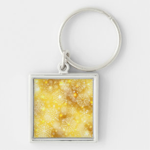 Schneeflocken auf goldenen Flächen Schlüsselanhänger