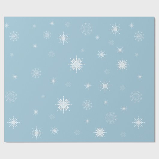 Schneeflocken auf hellblauem Packpapier (Flach)