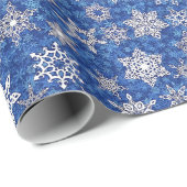 Schneeflocken auf saphienblauem Schneesturm-Hinter Geschenkpapier (Rolleneckpunkt)