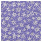 Schneeflocken auf violettem Schneesturm Stoff (Nahaufnahme)