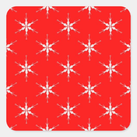 Schneeflocken aus Glas im roten Hintergrund Quadratischer Aufkleber (Vorderseite)