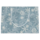 Schneeflocken im blauen Hintergrund Große Geschenktüte (Vorderseite)