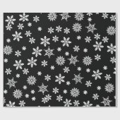 Schneeflocken im schwarzen Hintergrund Geschenkpapier (Flach)
