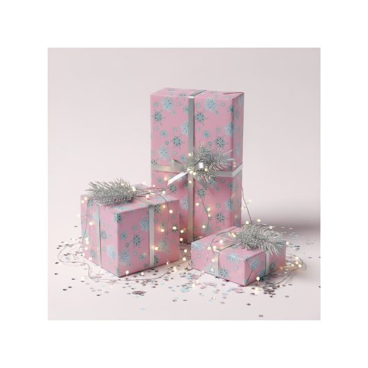 Schneeflocken in hellrosa geschenkpapier