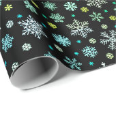 Schneeflocken in verschiedenen Farben formen elega Geschenkpapier (Rolleneckpunkt)