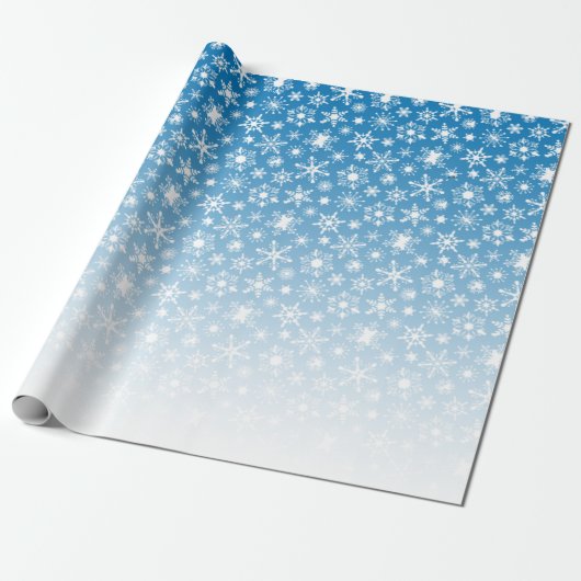 Schneeflocken mit blauer Steigung Geschenkpapier (Ungerollt)