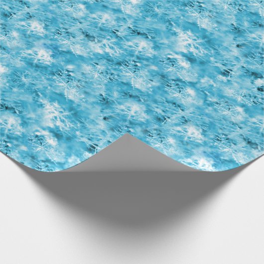 Schneeflocken und Eis im Aqua Geschenkpapier (Ecke)
