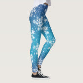 Schneeflocken und Sterne auf blass blauer Erde Leggings (Rechts)