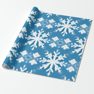 Schneeflockenmuster auf blauem Hintergrund Geschenkpapier