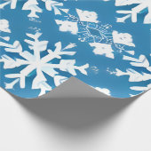 Schneeflockenmuster auf blauem Hintergrund Geschenkpapier (Ecke)