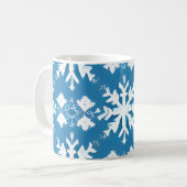 Schneeflockenmuster auf blauem Hintergrund Kaffeetasse (Vorderseite Links)