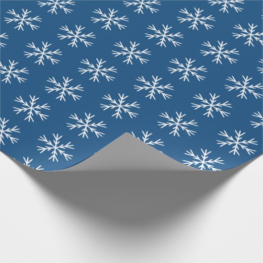 Schneeflockenmuster auf dunkelblau geschenkpapier (Ecke)