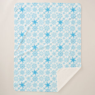 Schneeflockenmuster blau sherpadecke