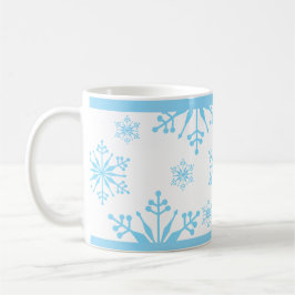 Schneeflockenmuster in Blau. Kaffeetasse