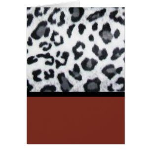 Schneeleopard mit Rot