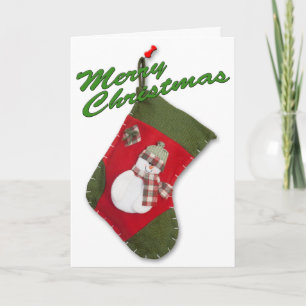 Schneemann auf Weihnachtsstrumpf über Weiß Feiertagskarte
