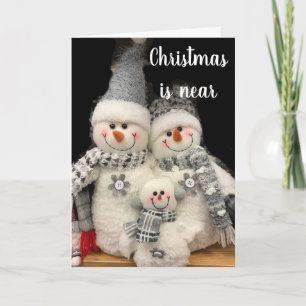 SCHNEEMANN-FAMILIE SAGT **FROHE WEIHNACHTEN** FEIERTAGSKARTE