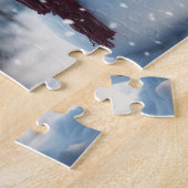 Schneemann im Dorf. Winterszene. Puzzle (Seite)