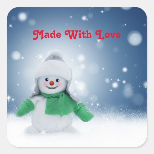 Schneemann mit grünem Schal Quadratischer Aufkleber (Vorderseite)