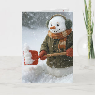 Schneemann schippt Schnee zu Weihnachten Karte