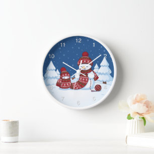 Schneemann strickt Weihnachts-Schal Wanduhr