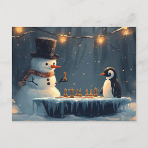 Schneemann und Pinguin spielen Schach Feiertagspostkarte