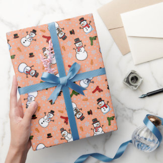 Schneemänner und Schneeflocken auf Pfirsich Geschenkpapier