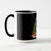 Schneemänner unter dem Baum: Eine Weihnachtsbotsch Tasse (Links)