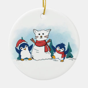 Schneepinguine bauen eine Weihnachtsschneekatze Keramik Ornament