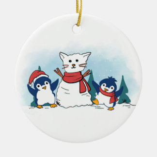 Schneepinguine bauen eine Weihnachtsschneekatze Keramik Ornament