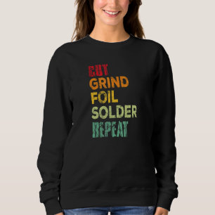Schneiden von Schleiffoliensolder Wiederholung ver Sweatshirt
