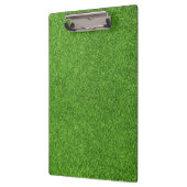 Schöne Beschaffenheit des grünen Grases vom Klemmbrett (Links)