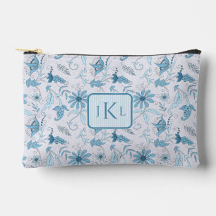 Schöne blaue Blumenmuster und blau gestreifte Mono Zubehörtasche