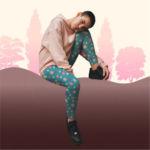 Schöne Blume auf dunkelgrünem Hintergrund Leggings
