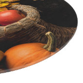 Schöne Cornucopia gefüllt mit Herbstgürteln Schneidebrett (Ecke)