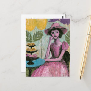 Schöne Frau an dem Cupcake-Tisch Postkarte