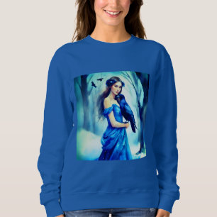 Schöne Frau mit einem Raben in einem Schneewald Sweatshirt