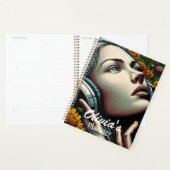 Schöne Frau mit Kopfhörern in Sonnenblumen Planer (Anzeige)