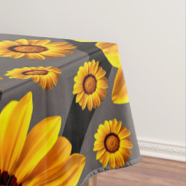 Schöne gelbe Blumen auf grauen, silbernen Streifen Tischdecke