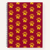 Schöne goldene Paws auf dem Maroon Notizblock (Vorderseite)