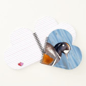 Schöne Harlequin-Ente am Felsen Notizbuch (Innenseite)