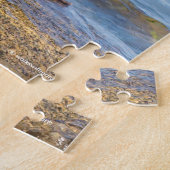 Schöne Harlequin-Ente am Felsen Puzzle (Seite)