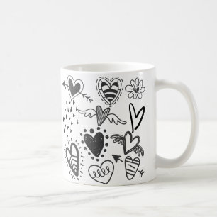 Schöne Herzen in schwarzer Tasse