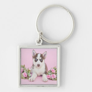 Schöne Husky-Welpe mit rosa Rosen Schlüsselanhänger