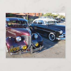 Schöne klassische Autos auf der Automesse Postkarte