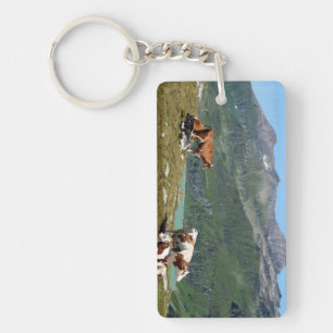 Schöne Kühe hoch oben in den Bergen Schlüsselanhänger